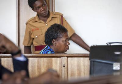 Nurse Found Guilty of HIV Transmission - Rosemary Namubiru, 64, was sentenced to three years in jail by an Ugandan court Monday for allegedly trying to infect a baby patient with HIV. The child's mother called Namubiru out when she saw that she had accidentally pricked her finger and was going to use the same contaminated needle to give an injection.   (Photo: AP Photo/Rebecca Vassie)