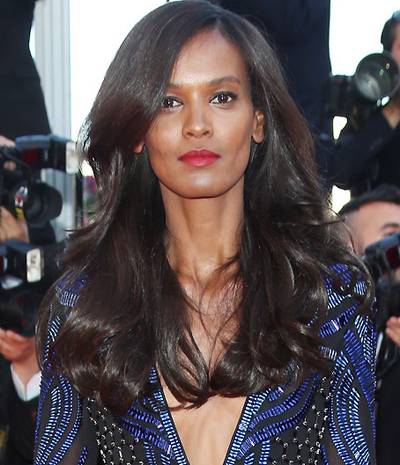 Liya Kebede  - In true supermodel form, Liya Kebede sends the paps into a frenzy at Cannes with bombshell hair and makeup. That coral lip though…(Photo: WENN.com)