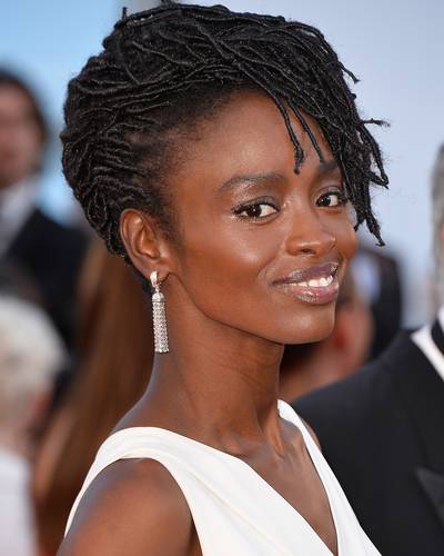 Aissa Maiga  - Just when you’re in search of new ways to style your dreads, Senegalese actress Aissa Maiga offers us this romantic natural ‘do. (Photo: Pascal Le Segretain/Getty Images)