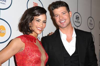 WORST: Robin Thicke's Apology Tour - After the phenomenal success of &quot;Blurred Lines,&quot; Thicke's world started to fall apart when his wife of nearly a decade, Paula Patton, filed for divorce. After the announcement, Robin went off the deep end trying to win Paula back — in the most public way possible. Whether serenading her with Marvin Gaye at his concerts or naming his next album after her, Thicke tried it all. Sadly, his marriage went the way of his album sales: bust. Worse yet, his public image went from sexy and cool to sad and pathetic in a matter of weeks.(Photo: Chelsea Lauren/Getty Images for Hyundai)