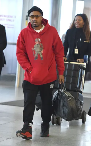 Legend on Board - Nas was spotted arriving at JFK airport in New York City.(Photo: Splash News)