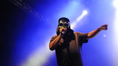 LONDON, ENGLAND - JULY 23:  Rapper MF Doom performs live on stage during the first day of the 'I'll Be Your Mirror' festival, curated By Portishead & ATP, at Alexandra Palace on July 23, 2011 in London, United Kingdom.  (Photo by Jim Dyson/Redferns)