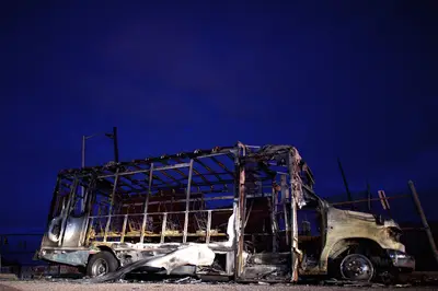 But that's exactly why others felt so hurt and angry the next day. - Not only has this senior center bus been reduced to ashes, but the senior center has, too.  (Photo: Mark Makela/Getty Images)