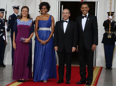 Mexico State Dinner - For her second state dinner, which honored Mexican President Felipe Calderon and his wife Margarita Zavala on May 19, 2010, the first lady once again did not disappoint. She is wearing a cobalt blue one shoulder, corset-style gown by New York designer Peter Soronen.&nbsp;   (Photo: Mark Wilson/Getty Images)