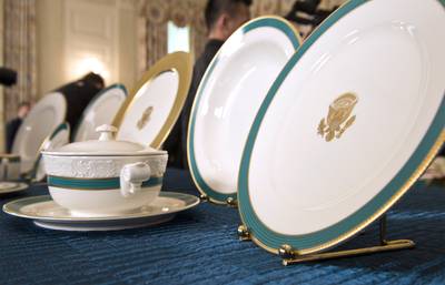 The Obama State China Service - The Obama State China Service, which the first lady helped design, will be used for the first time at the dinner. According to the White House, the unifying color, which she calls Kailua Blue, was inspired by the waters off Hawaii and is featured on bands with a crisp motif of relief lines.&nbsp;Mrs. Obama's&nbsp;goal for the 11-piece plate setting for 320 was to offer a more modern design aesthetic that will also complement preceding state services. The Obama service was paid for with a donation from the White House Endowment Trust. (Photo: MAI/Greg E. Mathieson /Landov)