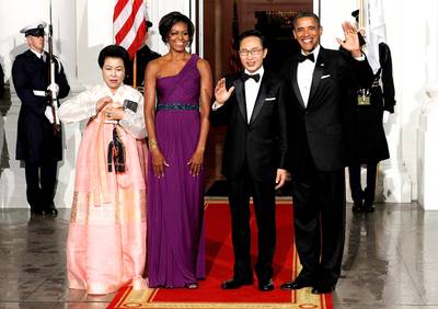 South Korea State Dinner - This custom purple jersey, one-shoulder gown was created by Korean-American designer Doo-ri Chung. The first lady wore it at the dinner honoring South Korean President Lee Myung-bak and wife Kim Yoon-ok on Oct. 13, 2011. (Photo: Alex Wong/Getty Images)
