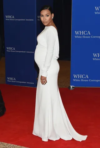 Naya Rivera - The very pregnant Glee star showed off her baby bump in a white long-sleeved crepe gown with a draped cowl back by Tadashi Shoji.&nbsp; (Photo: Michael Loccisano/Getty Images)