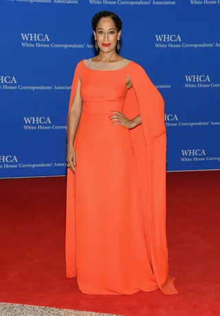 Tracee Ellis Ross - Orange is the new Black-ish with this floor-length cape dress accented by a sheer neckline.(Photo: Michael Loccisano/Getty Images)