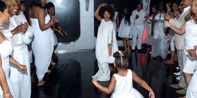 Auntie Solo - Part the crowd! Blue's about to break it down. The little one danced up a storm with her aunt Solange during the reception.(Photo: Cliff Watts/Beyonce.com). For more photos log on to beyonce.com