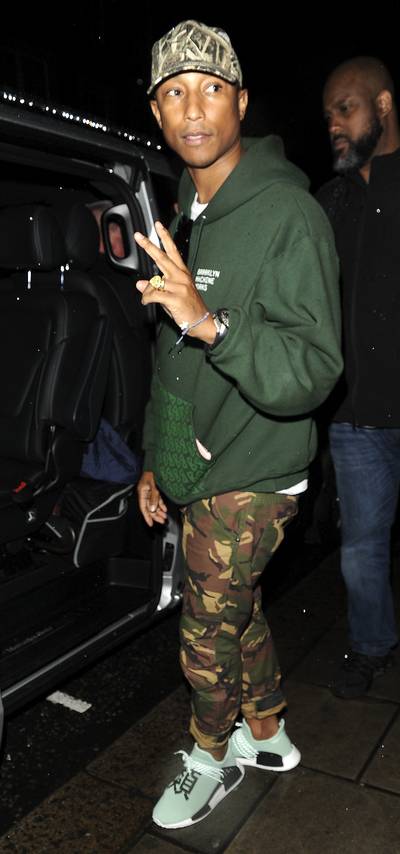 Camo Galore - Pharrell Williams rocked his original sway as he made his way to the 34 Restaurant Mayfair in the U.K.&nbsp;(Photo: Tim McLees/WENN.com)