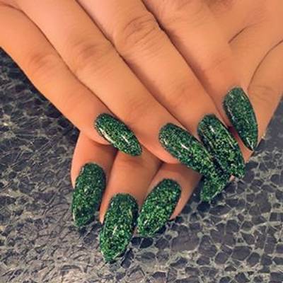 Amber Rose - Lesson learned here: dazzling green micro glitter makes a standard black polish lit for the gawds.(Photo: Amber Rose via Instagram)