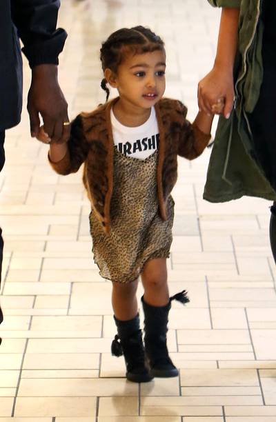 Her Favorite Tee - This Thrasher T-shirt is a fav of Nori's. We've seen her wear the tee on multiple occasions. Most recently, she styled it with a leopard print dress at a birthday party at Build-a-Bear.(Photo: FameFlynet, Inc)