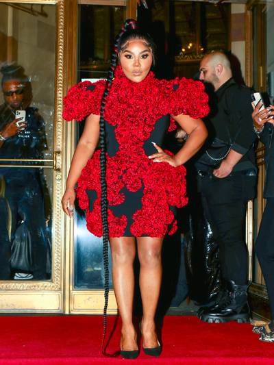 SEPT. 7: Lil' Kim - The Queen Bee exuded high fashion as she strutted in a floral Christian Siriano dress before heading to the designer’s Spring/Summer RTW show.&nbsp; (Photo by Nancy Rivera/Bauer-Griffin/GC Images) (Photo by Nancy Rivera/Bauer-Griffin/GC Images)
