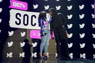 Tammy Rivera and Waka Flocka&nbsp;play around on stage. - (Photo: Marcus Ingram/Getty Images for BET)&nbsp;