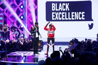 DC Young Fly and Jess Hilarious talk to the crowd. - (Photo: Bennett Raglin/Getty Images for BET)&nbsp;
