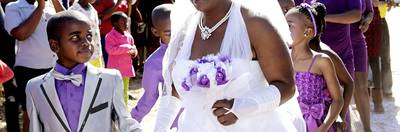 Woman Remarries Boy in Ceremony - Saneie Masilela, 9, who married Helen Shabangu, 62, last year, repeated the ceremony for the second time. The boy said he was told by his late grandfather, who had never married, to get married. The couple says the ceremony is symbolic. They don't have sexual relations and do not live together. (Photo: Raymond Preston/Sunday Times/Gallo Images/Getty Images)