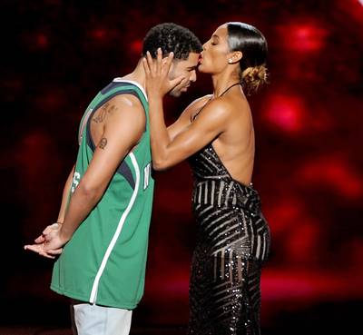 Drake Gets a Kiss From Skylar Diggins - Drizzy's longtime crush on Skylar Diggins&nbsp;came to a head at the ESPYs on Wednesday night, when the female basketball star agreed to give the Young Money MC a kiss. Just as the host puckered up, Skylar planted a smooch right on his forehead. Can you say friend zone?(Photo: Kevin Winter/Getty Images)