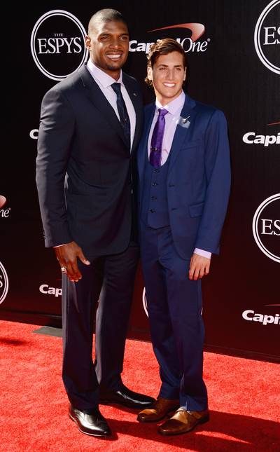 Michael Sam and Vito Cammisano - The St. Louis Rams defensive end, who is the NFL?s first openly gay player, suits up with boyfriend Vito Cammisano.(Photo: Jason Merritt/Getty Images)