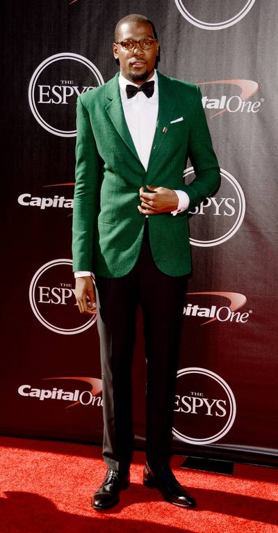 Kevin Durant - The Oklahoma City Thunder small forward, who took home Male Athlete of the Year honors, makes a colorful arrival in an emerald dinner jacket and sharp bow tie.  (Photo: Jason Merritt/Getty Images)