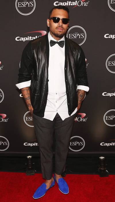 Chris Brown - The “Loyal” crooner accessorizes his crisp shirt and trousers with a leather cardigan, bow tie and smoking slippers. Edgy-meets-cool at its finest.  (Photo: Christopher Polk/Getty Images For ESPYS)