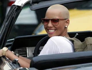 Amber Rose (@DaRealAmberRose) - Socialite Amber Rose is missing someone special. She constantly tweets about her boyfriend Wiz Khalifa. TWEET: "2 more hours till I'm in my baby's arms. 2 weeks away from him is way to long. :-)"  (Photo: Roy Sonobel/Retna Ltd.)