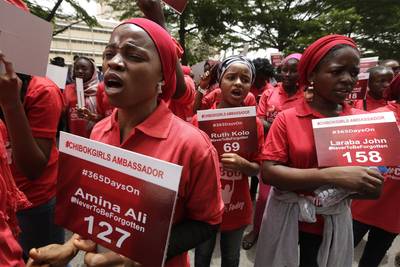 From &quot;Bring Back Our Girls,&quot; to &quot;Never to Be Forgotten&quot; - More than 200 protesters dubbed “Chibok ambassadors” marched through Nigeria’s capital on April 14, 2015. As of that Tuesday, the 276 girls abducted from their boarding school by Boko Haram had been missing for exactly a year. President-elect Muhammadu Buhari has since released a statement saying he could not promise the girls would be found and rescued.&nbsp;(Photo: AP Photo/Sunday Alamba)