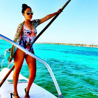 La La Anthony - La La is oh-so-fierce in her tiger-print one-piece and coordinating cover-up. The yacht life suits her.  (Photo: LaLa Anthony via Instagram)