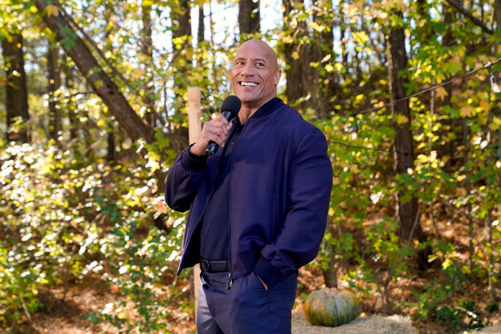 Young Rock -- "Working The Gimic" Episode 101 -- Pictured: Dwayne Johnson as Himself -- (Photo by: Frank Masi/NBC/NBCU Photo Bank via Getty Images)