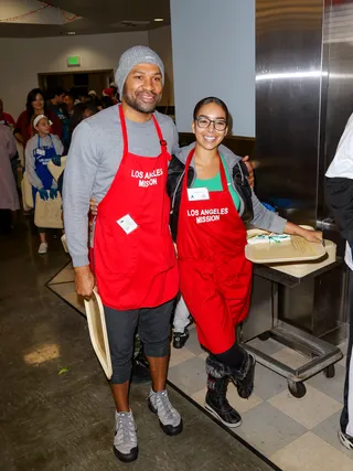 Derek Fisher and Gloria Govan - Derek Fisher and Gloria Govan are hard at work at L.A. Mission Christmas Dinner for the Homeless in Los Angeles.&nbsp;(Photo: gotpap/Bauer-Griffin/GC Images)&nbsp;
