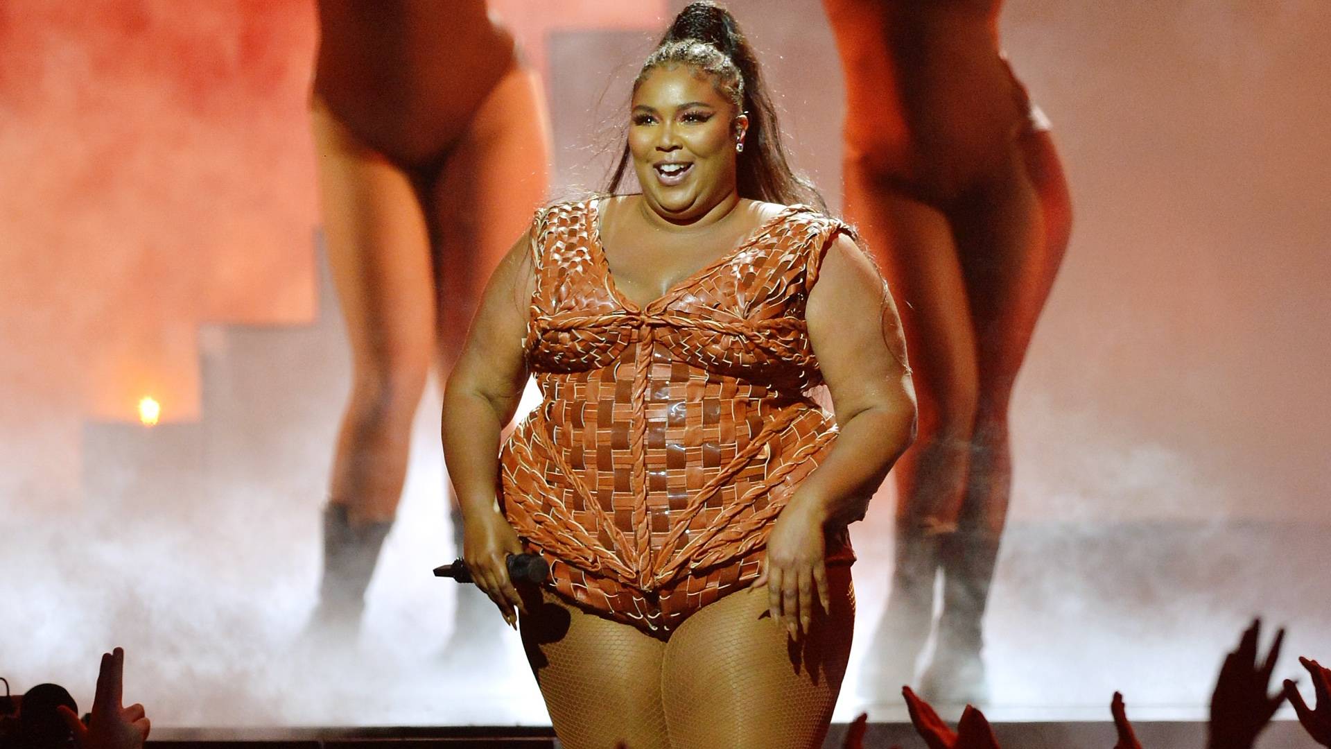 Lizzo’s Lacy Black Bodysuit Promotes Body Positivity