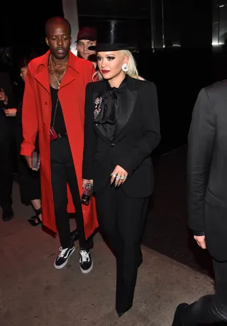 Rita Ora&nbsp; - Rita Ora&nbsp;attended the 2019 Met Gala Boom Boom After-party in a sleek black suit&nbsp;which she accessorized with multiple rings and a chic top hat.(Photo: Daniel Zuchnik/GC Images)