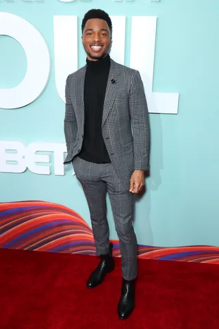 Christopher Jefferson poses on the red carpet. - (Photo by Leon Bennett/Getty Images for BET)