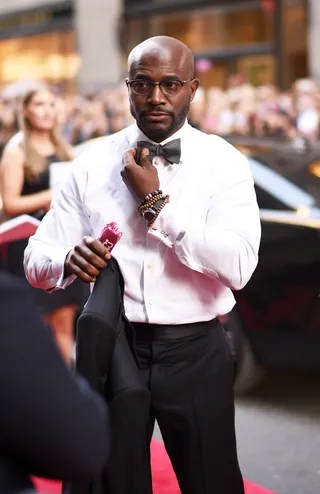 Suited and Booted - Taye Diggs adjusts his bow tie before heading inside the 2015 Tony Awards at Radio City Music Hall in New York City.(Photo: Andrew H. Walker/Getty Images for Tony Awards Productions)