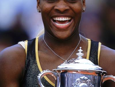 2002 French Open - June 2002 —&nbsp;Serena Williams&nbsp;was all smiles, defeating her older sister Venus Williams on the clay court for her first French Open win.&nbsp;(Photo: Mike Hewitt/Getty Images)