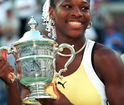 1999 U.S. Open - Serena Williams&nbsp;was only 17-years-old when she defeated Martina Hingis to win her first U.S. Open and Grand Slam title. Yeah...starting her reign atop women's tennis was a good reason to flash those pearly whites.&nbsp;&nbsp;(Photo:&nbsp;Jamie Squire/Getty Images)