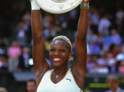 2002 Wimbledon&nbsp; - Serena Williams will never forget her first Wimbledon trophy, which she scored by also defeating her sister Venus Williams in straight sets.(Photo: Mike Hewitt/Getty Images)