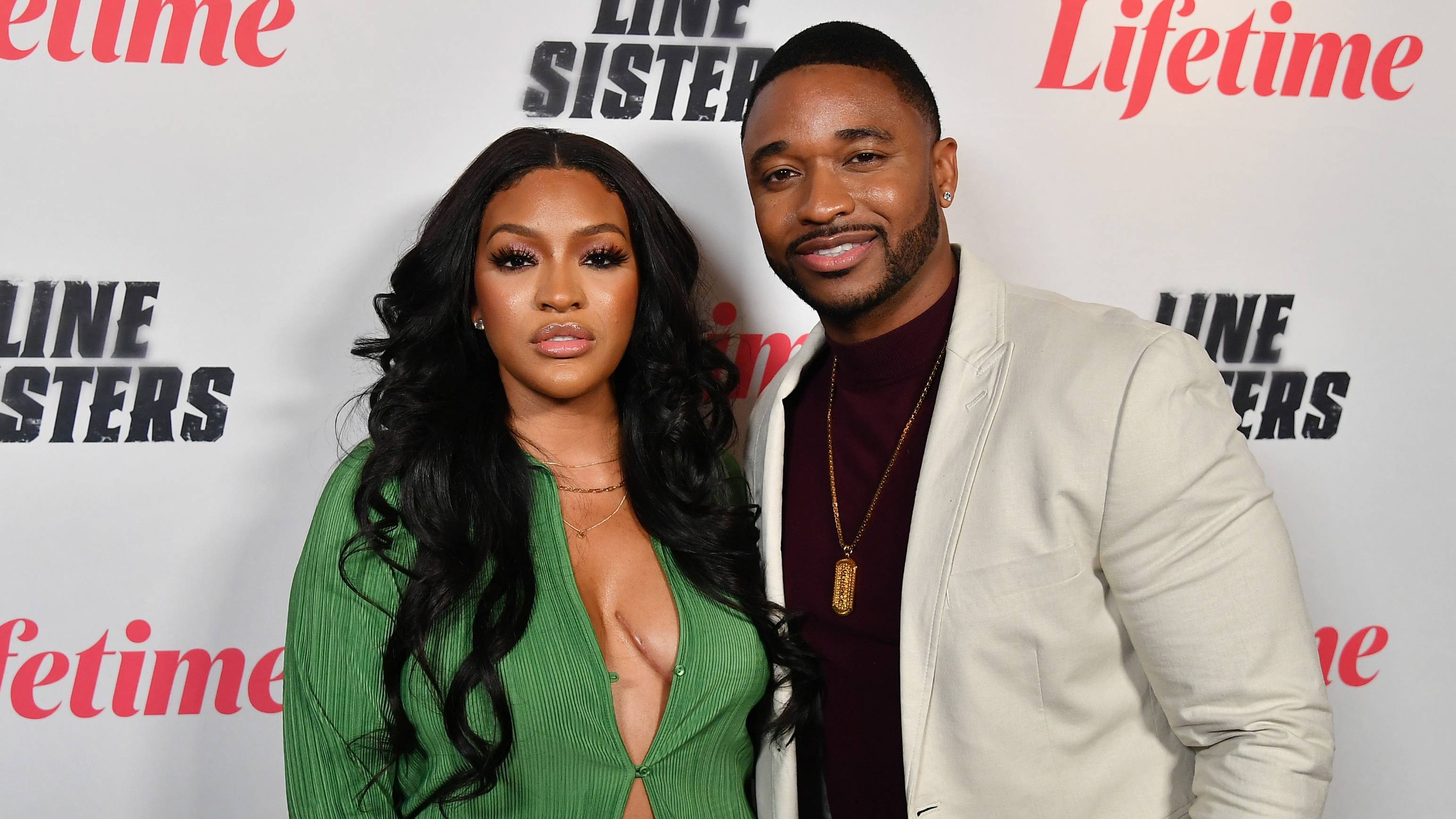 Drew Sidora and Ralph Pittman attend the Atlanta screening of Lifetime's "Line Sisters" at IPIC Theaters at Colony Square on Feb. 10, 2022.