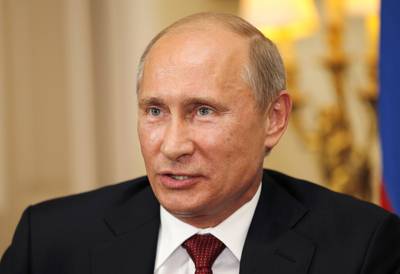 Putin to Cooperate? - Showing his first sign of international compromise, Russian leader Putin revealed on Sept. 4 that he would “not rule out” backing military action if watertight proof justified using force and the U.N. Security Council approved the move.(Photo: Sang Tan - WPA Pool /Getty Images)