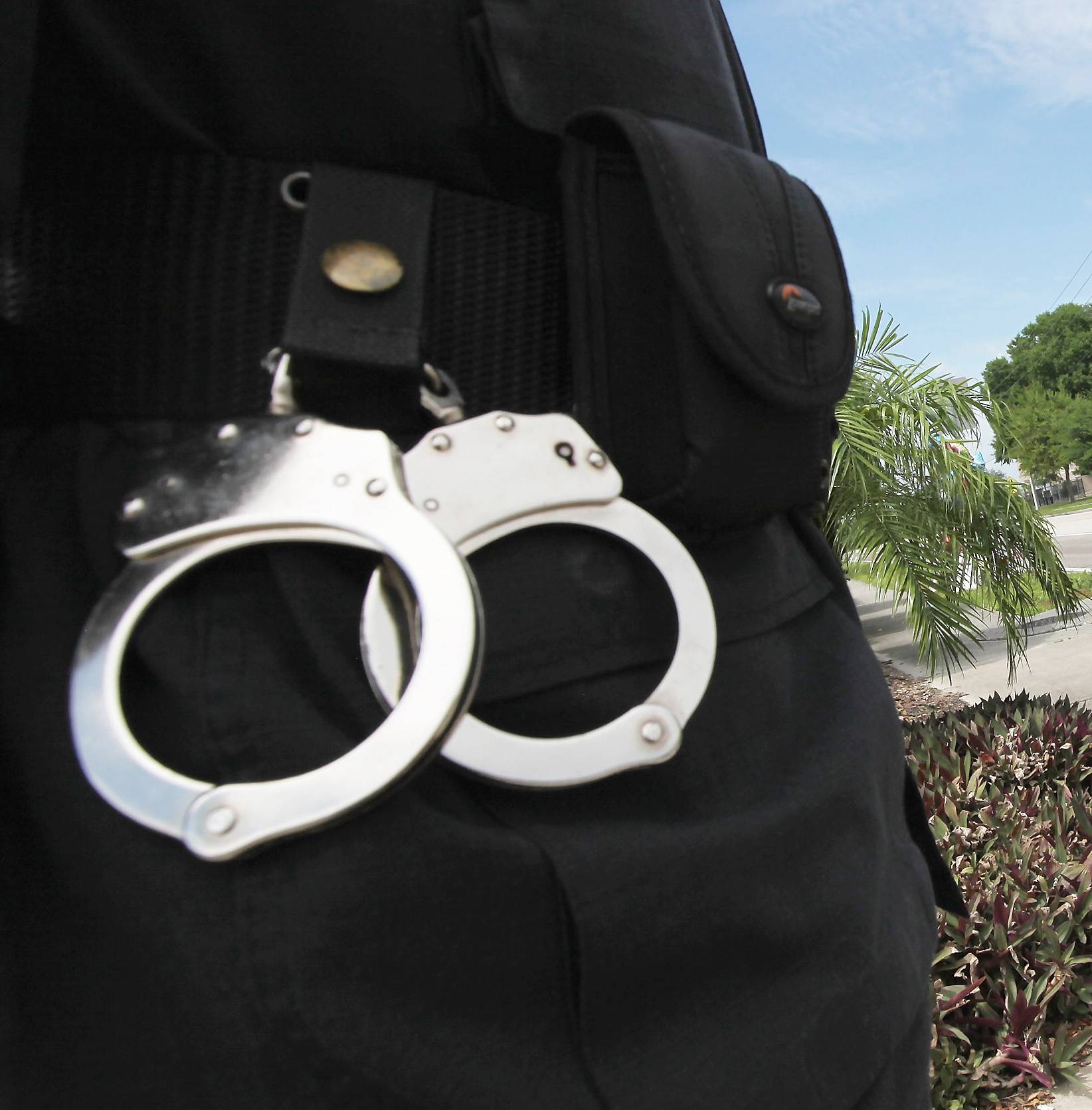 police handcuffing children