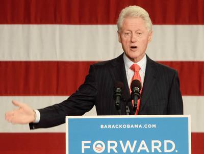 Former President Bill Clinton on President Obama - &quot;Conditions are improving and if you'll renew the president's contract you will feel it,&quot; the former president said during his rousing Democratic National Convention address.&nbsp;(Photo: Darren McCollester/Getty Images)