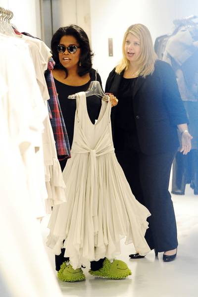 The Fluffy Slipper - Oprah Winfrey goes on a comfy shopping excursion in NYC wearing colorful cushy slippers at Morgane Le Fay. The billionaire media queen was full of smiles and even made a cameraman crack up as she made her way into the upscale clothing store. (Photo: Hall/Pena, PacificCoastNews.com)