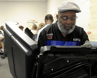 Vote Early - In many states you can avoid the long lines by taking advantage of the early voting period. To find out if your state offers that option, visit www.canivote.org and click on the link for absentee and early voting. You can also visit your state's secretary of state website. (Photo: Sara D. Davis/Getty Images)