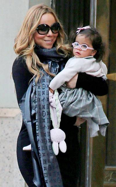 Mommy and Me&nbsp; - Mariah Carey carries her baby daughter Monroe while out for a walk in her Tribeca neighborhood.(Photo: PacificCoastNews.com)