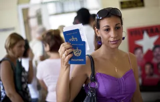 Cuba Ends Travel Exit Permit Use - Cuba announced that it will relax travel restrictions on its citizens by getting rid of “exit permits” which have long been required to leave the country. (Photo: AP Photo/Ramon Espinosa)