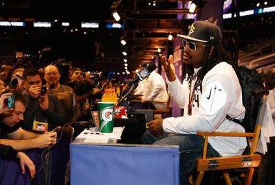 Seven Burning Questions No One Asked Marshawn Lynch at Media Day - So Marshawn Lynch repeated &quot;I'm just here so I won't get fined&quot; 29 times in four minutes and 51 seconds during Super Bowl media day on Tuesday in Phoenix. It's no secret Beast Mode isn't a fan of public speaking, but maybe no one is asking the right questions. You've got to know what to ask! You can say these responses are like the GIFs that keep on giving. (Photo: Christian Petersen/Getty Images)