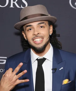 Dee-1 - Dee-1 mixed up his color palette&nbsp;and topped it off with this red carpet head gear.(Photo: Bennett Raglin/BET/Getty Images for BET)