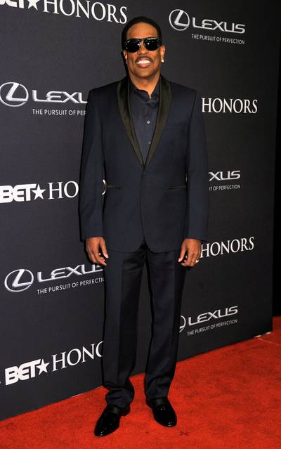 Charlie, Last Name Wilson  - Singer Charlie Wilson is suited up in his black-tie affair wear for the The BET Honors 2015 ceremony. (Photo: Kris Connor/BET/Getty Images for BET)
