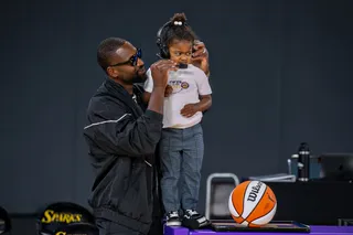 Dwyane Wade And Kaavia James - Baby Kaavia accompanied her dad and big brother to the LA Sparks WNBA game recently. The adorable toddler even participated in half-time interviews with her NBA Champ dad. Unfortunately mama, Gabrielle Union wasn't there but she shared the adorable pics to Instagram. "@kaaviajames&nbsp;1st&nbsp;@la_sparks&nbsp;game!! Im crushed I missed her witnessing the beauty and brilliance of the&nbsp;@wnba&nbsp;but so glad she got this experience with&nbsp;@dwyanewade&nbsp;@zaire&nbsp;and even got to see her uncle&nbsp;@kingjames&nbsp;🏀🏀🏀👶🏾🖤&nbsp;#FamilyOverEverything&nbsp;#WeAllWeGot," read her caption. How cute!&nbsp; (Photo: Getty Images)