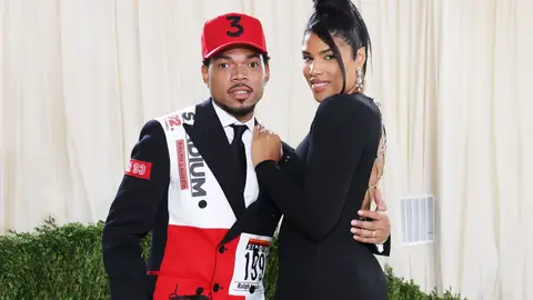 Chance the Rapper and Kirsten Corley depart The 2021 Met Gala Celebrating In America: A Lexicon Of Fashion at Metropolitan Museum of Art on September 13, 2021 in New York City. 
