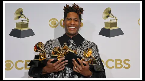 APRIL 03: Jon Batiste winner of best American roots performance, best American roots song, best music video and best score soundtrack for visual media poses in the winners photo room during the 64th Annual GRAMMY Awards at MGM Grand Garden Arena on April 03, 2022 in Las Vegas, Nevada.  